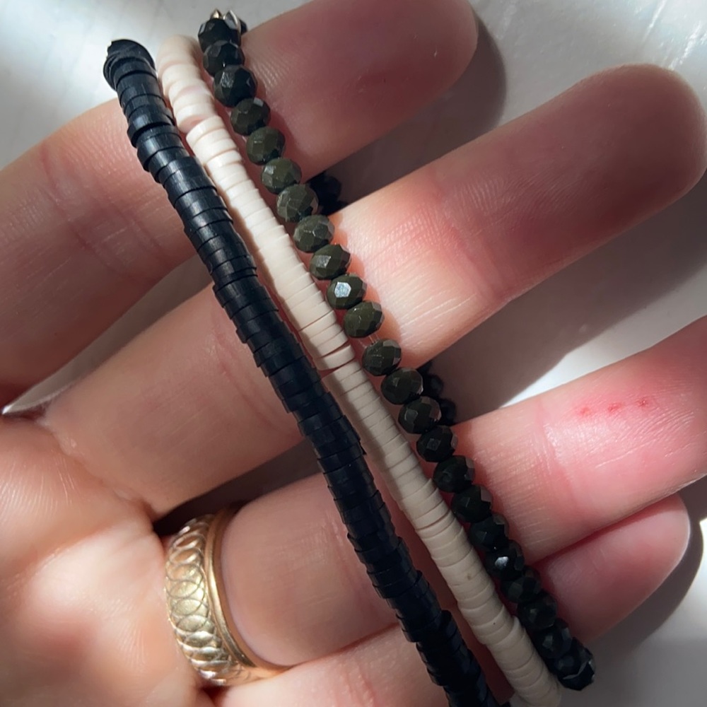 3 RLXCL bracelets.